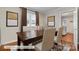 Dining room featuring a dark wood table and seating for six under natural light at 3231 Eastwood Dr, Charlotte, NC 28205