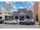 Charming Haberdish building with sleek gray brick, ample parking, and large windows at 3231 Eastwood Dr, Charlotte, NC 28205