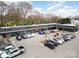 Commercial property featuring storefronts with ample parking and a modern design at 3231 Eastwood Dr, Charlotte, NC 28205