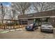 Artisan's Palate exterior with parking, outdoor patio, and modern brick design at 3231 Eastwood Dr, Charlotte, NC 28205
