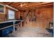 A well-organized garage space with ample storage and a variety of tools neatly displayed on the walls at 3231 Eastwood Dr, Charlotte, NC 28205