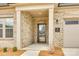 Inviting front door with brick facade and covered porch, providing a warm welcome to the home at 333 Lifestyle Ct, Cramerton, NC 28056