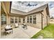 Charming back patio featuring outdoor furniture and brick exterior of home at 333 Lifestyle Ct, Cramerton, NC 28056