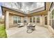 Covered back patio with comfortable seating area, ideal for outdoor living at 333 Lifestyle Ct, Cramerton, NC 28056