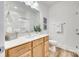 Bathroom with vanity, large mirror, and decorative tiles to enhance its appeal at 333 Lifestyle Ct, Cramerton, NC 28056