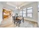Dining room with natural light and an open view of the kitchen and living spaces at 333 Lifestyle Ct, Cramerton, NC 28056