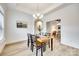 Formal dining room with natural light and an arched doorway to the living area at 333 Lifestyle Ct, Cramerton, NC 28056