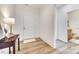 Bright entryway with wood floors, modern decor and bathroom access at 333 Lifestyle Ct, Cramerton, NC 28056