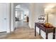 Inviting hallway with wood floors, archways, and a decorative welcome sign at 333 Lifestyle Ct, Cramerton, NC 28056