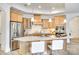 Modern kitchen with stainless steel appliances, granite countertops, and a breakfast bar at 333 Lifestyle Ct, Cramerton, NC 28056