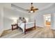 Spacious main bedroom with ceiling fan and an ensuite bath at 333 Lifestyle Ct, Cramerton, NC 28056