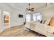 Spacious main bedroom featuring trey ceilings, ceiling fan and sitting area at 333 Lifestyle Ct, Cramerton, NC 28056