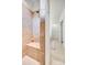 Walk-in shower with a built-in bench and neutral tile at 333 Lifestyle Ct, Cramerton, NC 28056
