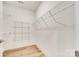 Organized walk-in closet with wire shelving for optimized storage solutions at 333 Lifestyle Ct, Cramerton, NC 28056