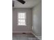 Bedroom with a window and light gray walls at 3410 Nc 109 N Hwy, Wadesboro, NC 28170