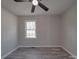 Bedroom featuring a modern ceiling fan, window, and light gray walls at 3410 Nc 109 N Hwy, Wadesboro, NC 28170