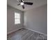 Bedroom with a window and light gray walls at 3410 Nc 109 N Hwy, Wadesboro, NC 28170