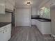 Modern kitchen with sleek countertops, white cabinets, and stainless steel appliances at 3410 Nc 109 N Hwy, Wadesboro, NC 28170