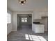 Kitchen with plenty of natural light, white cabinets, and a seamless transition to living area at 3410 Nc 109 N Hwy, Wadesboro, NC 28170