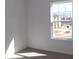 Bright bedroom with a large window overlooking the neighborhood and plush carpet at 3427 Secrest Lndg, Monroe, NC 28110
