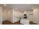 Bright kitchen featuring white cabinets, stainless steel appliances, granite countertops, and a center island at 3427 Secrest Lndg, Monroe, NC 28110