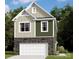 Charming two-story home featuring mixed siding, stone accents, and an attached two-car garage at 3522 Nimbell Rd, Monroe, NC 28110