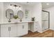 Modern bathroom with double sinks, vanity with lots of storage, and a glass-enclosed shower at 3598 Puett Park Dr, Conover, NC 28613