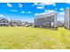 Spacious backyard featuring lush green grass and well-maintained landscaping, perfect for outdoor activities and relaxation at 4021 Eckels Dr, Charlotte, NC 28215
