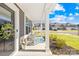 Inviting front porch with chairs, floral decorations, and a 'Welcome' wreath on the front door at 4021 Eckels Dr, Charlotte, NC 28215