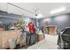 Well-lit, cluttered garage providing ample storage space, a practical area for projects and organization at 4021 Eckels Dr, Charlotte, NC 28215