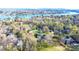 Picturesque aerial view of luxury homes surrounded by lush trees and a beautiful lake at 4025 4Th Street Nw Ln, Hickory, NC 28601
