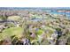 Stunning aerial view of waterfront homes surrounded by mature trees and a tranquil lake at 4025 4Th Street Nw Ln, Hickory, NC 28601