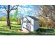 Backyard storage shed offering practical solutions for tools and outdoor equipment, set in a lush yard at 4025 4Th Street Nw Ln, Hickory, NC 28601