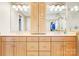Bathroom vanity with double sinks, ample storage cabinets, and drawers in a bright, well-lit space at 4025 4Th Street Nw Ln, Hickory, NC 28601