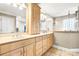 Bright bathroom with double vanity, walk-in shower, and ample counter space for enhanced comfort at 4025 4Th Street Nw Ln, Hickory, NC 28601