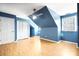 Bedroom with high ceilings, multiple windows, hardwood floors and a closet creating an inviting space at 4025 4Th Street Nw Ln, Hickory, NC 28601
