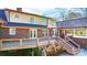 A spacious wooden deck extends from the home, ideal for outdoor dining and relaxation at 4025 4Th Street Nw Ln, Hickory, NC 28601