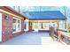 View from the deck showcasing the home's architectural details and outdoor entertainment space at 4025 4Th Street Nw Ln, Hickory, NC 28601