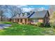 Beautiful brick home with a manicured lawn and colorful landscaping at 4025 4Th Street Nw Ln, Hickory, NC 28601