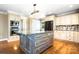 Gourmet kitchen with a large island, stainless steel appliances, and custom cabinets at 4025 4Th Street Nw Ln, Hickory, NC 28601