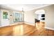 Cozy living room featuring hardwood floors, arched entryway and large window at 4025 4Th Street Nw Ln, Hickory, NC 28601