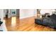 Spacious living room with hardwood floors and large windows offering natural light at 4025 4Th Street Nw Ln, Hickory, NC 28601