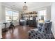 Stylish bar area featuring display shelves and cooler at 4028 Shadowbrook Rd, Waxhaw, NC 28173