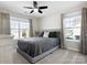 Relaxing bedroom featuring a comfortable bed, neutral colors, and natural light at 4028 Shadowbrook Rd, Waxhaw, NC 28173