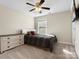 A cozy bedroom with a neutral color palette, complemented by carpeted floors at 4028 Shadowbrook Rd, Waxhaw, NC 28173