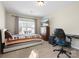 Comfortable bedroom setup with desk, TV and chair ready for work or play at 4028 Shadowbrook Rd, Waxhaw, NC 28173
