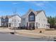 Charming two-story home featuring a well-maintained yard and traditional architectural details at 4028 Shadowbrook Rd, Waxhaw, NC 28173
