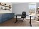 Office with hardwood floors, a desk, and built-in storage at 4028 Shadowbrook Rd, Waxhaw, NC 28173