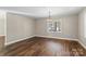 Dining room featuring hardwood floors, recessed lights, and natural light from a window at 406 E 29Th St, Kannapolis, NC 28083