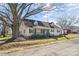 Charming two-story home with a covered front porch and mature trees at 406 E 29Th St, Kannapolis, NC 28083